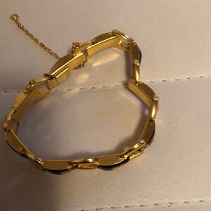 Elegant Gold and Black Floral Bracelet